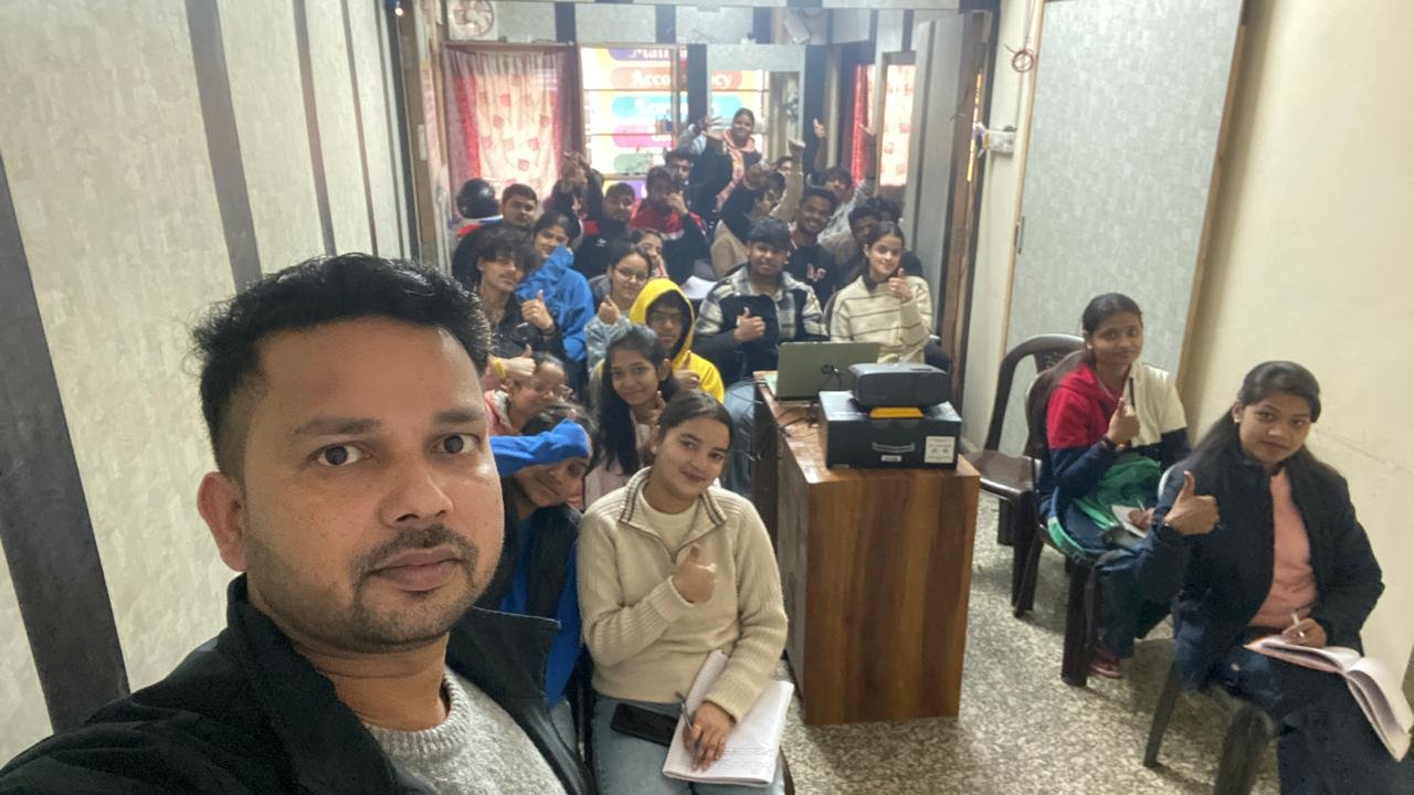Teacher with happy students at Sunlight Computers
